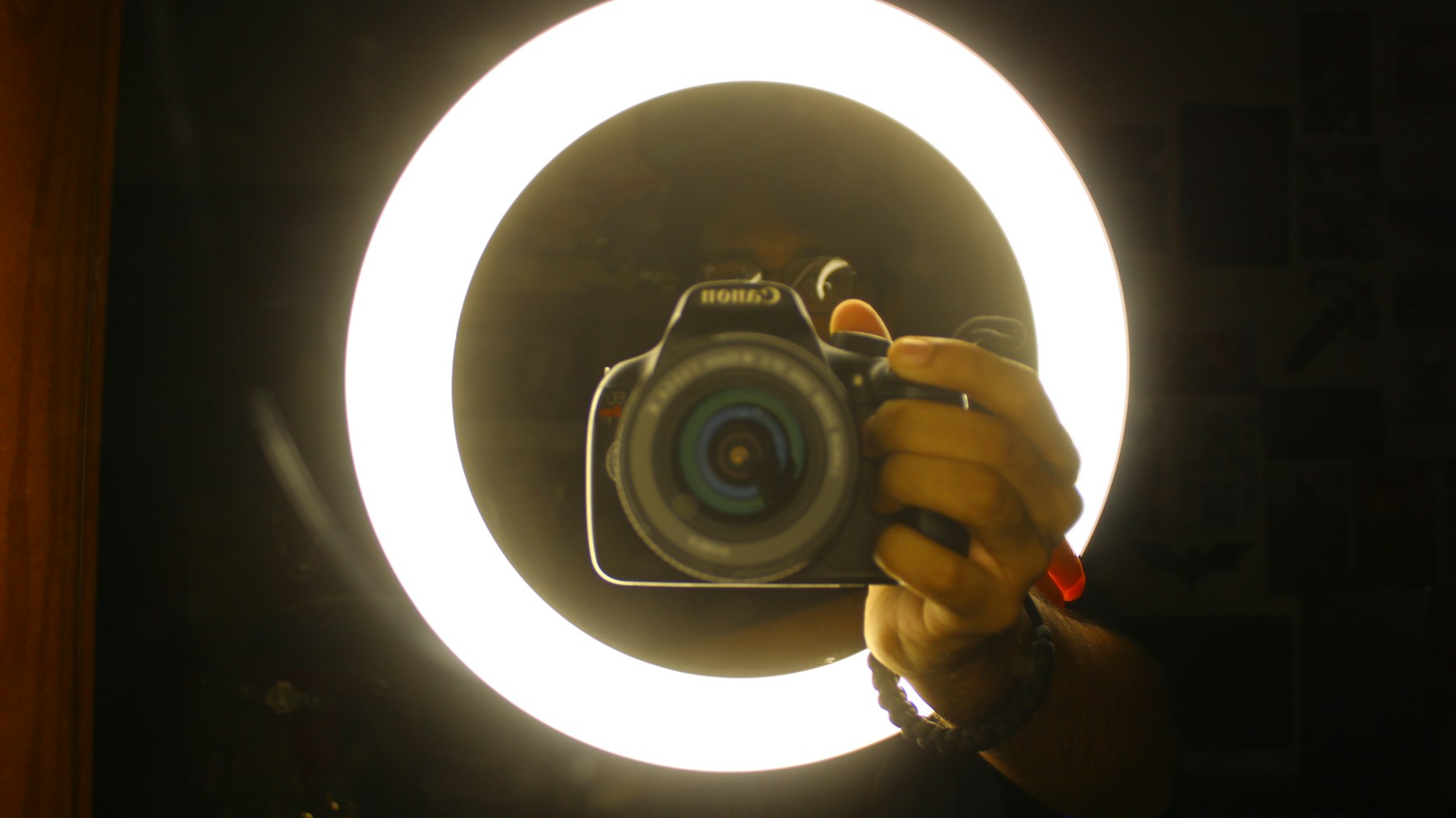 Influencer filming content using a professional camera and ring light