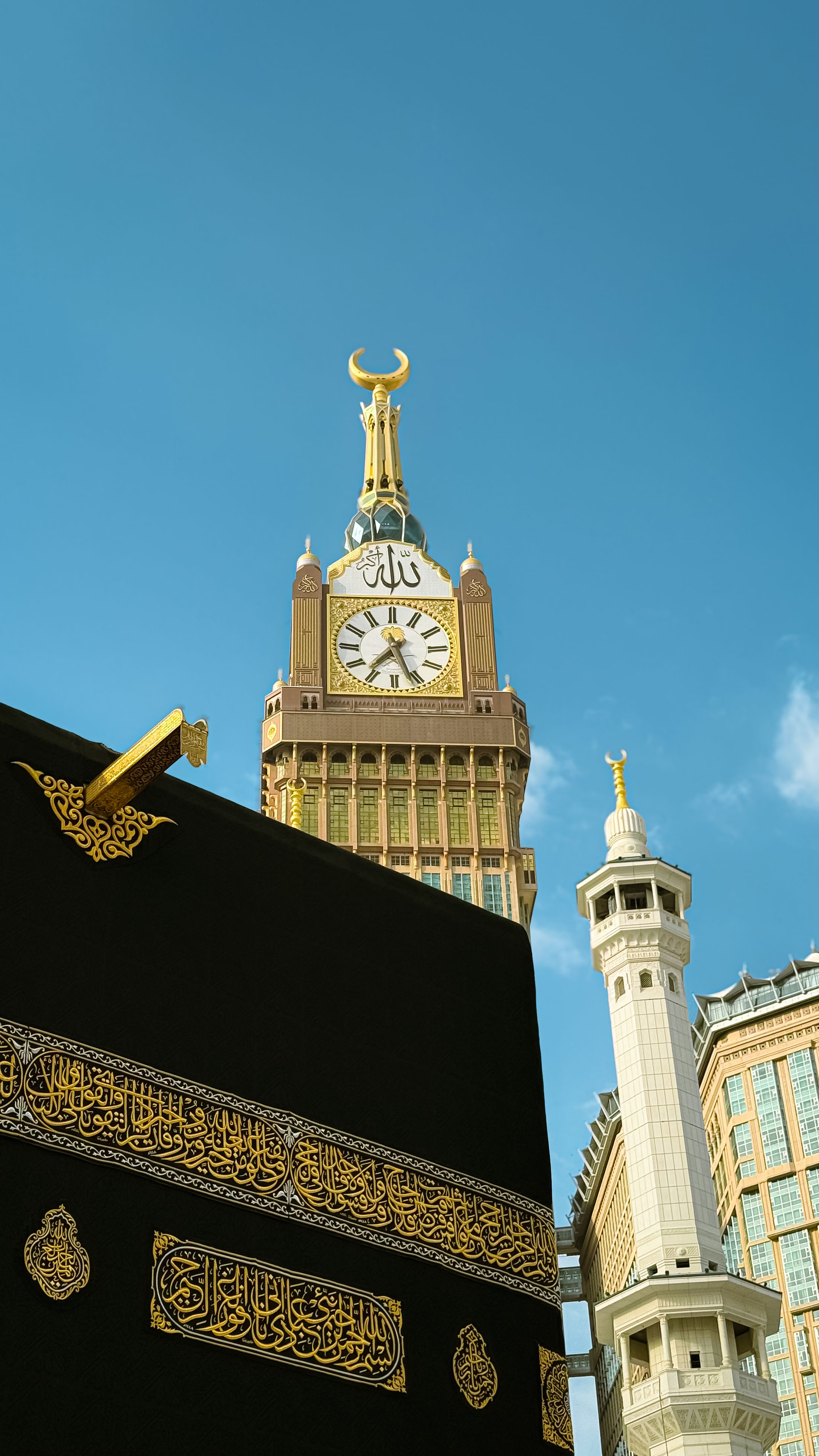 The Holy Kaaba and Abraj Al Bait clock tower in Makkah